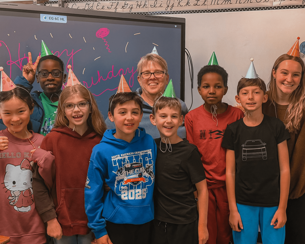 Students smiling together in a classroom at Abundant Life Christian School